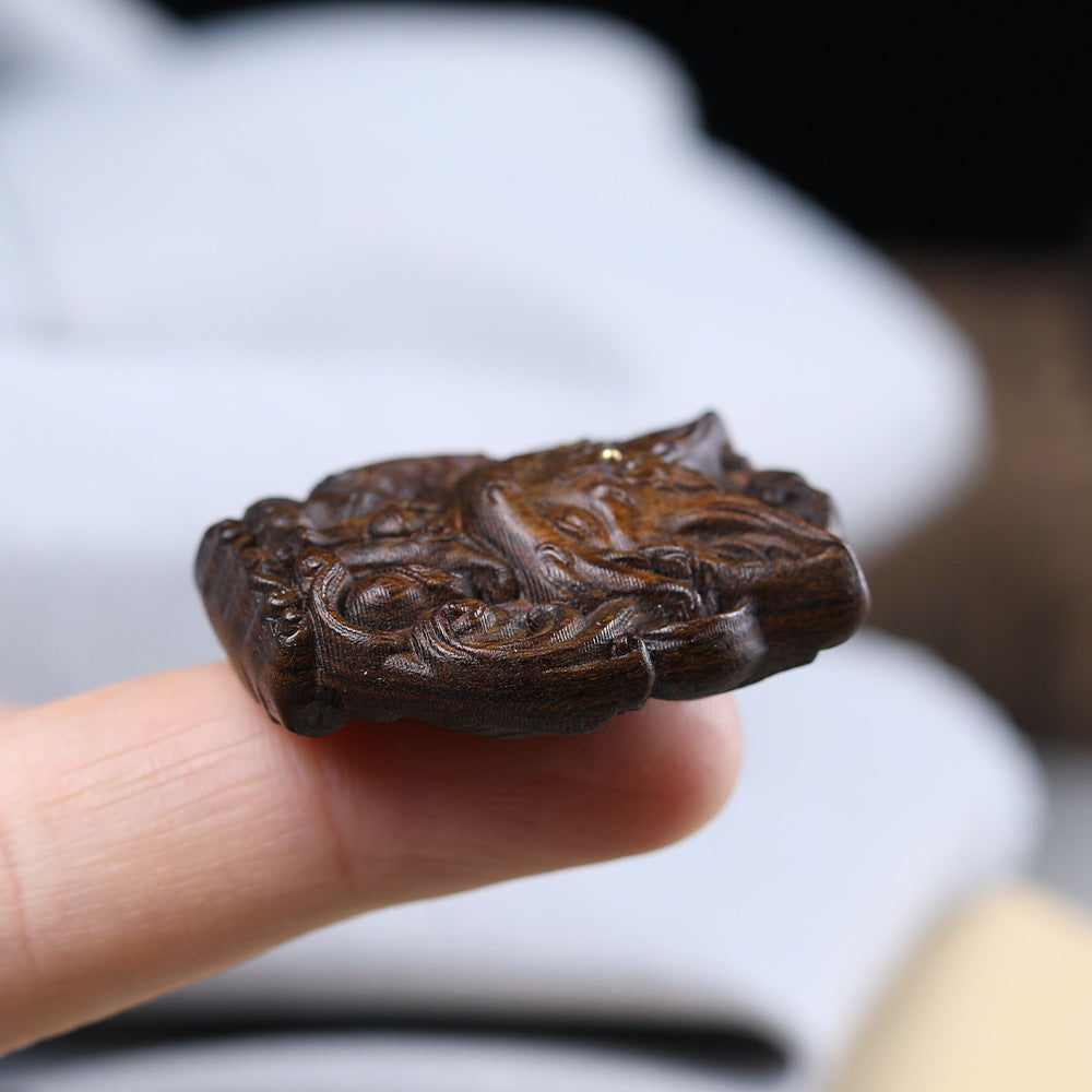 - Hand-Carved Agarwood Nine-Tailed Fox Pendant - Unique Mythical Jewelry Accessory