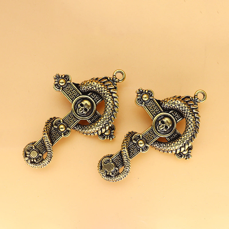 Vintage Brass Cross Dragon & Skull Pendant, Retro Coiled Dragon Skeleton Charm, Antique Brass Keychain or Pendant, Gothic Jewelry Decor