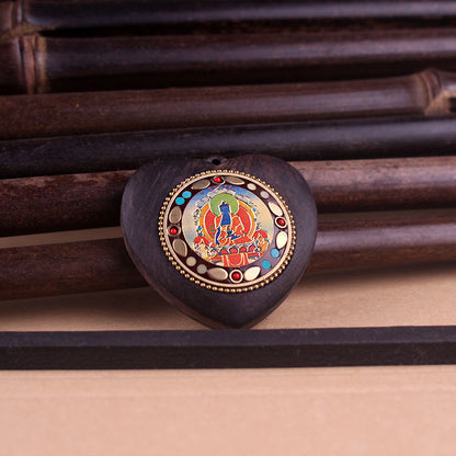 Heart-Shaped Yellow Jambhala Buddha Pendant - Tibetan Nepalese Thangka Wealth Eye Peace Token