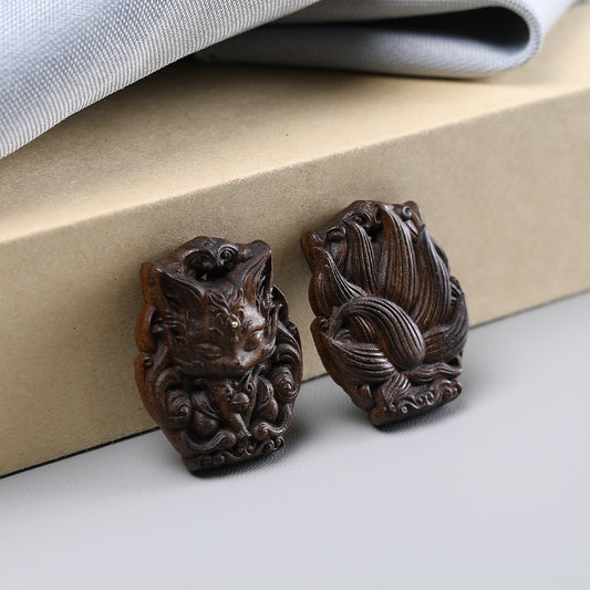 - Hand-Carved Agarwood Nine-Tailed Fox Pendant - Unique Mythical Jewelry Accessory