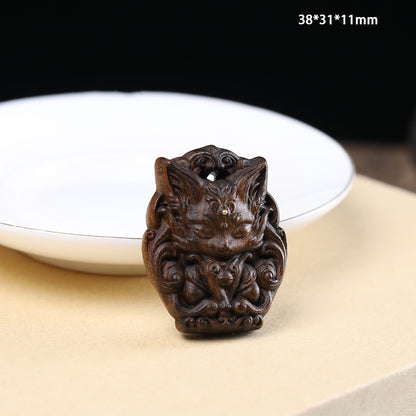- Hand-Carved Agarwood Nine-Tailed Fox Pendant - Unique Mythical Jewelry Accessory